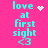 Cyan text 'love at first sight <3' on bright pink background with animated pixel heart and starburst effects.