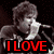 A pixelated image of a person singing into a microphone with red text reading "I LOVE MARTIN" and partial text "JOHNSO" below.