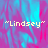 Pixelated text "Lindsey" in yellow with quotation marks appears on a pink and blue gradient background with a gray rectangular overlay.