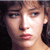 Static 50x50 pixel icon showing a close-up of a person's face with dark hair, visible eyes, nose, lips, and skin tones under bright lighting.