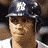 A 4-frame contact sheet of a baseball player in a New York Yankees helmet across different angles and expressions, with one frame showing repeated text on a black background.