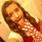 Pixelated image of a person with long brown hair wearing red and white clothing against a light background.