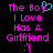 Pixelated text in pink and cyan on black background with a heart symbol replacing 'o' in 'Boy'.