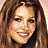 A 2x2 contact sheet of four pixelated frames showing a woman with long brown hair in various poses and expressions, with "Coolbuddy.com" text on the bottom-right frame.