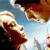 Pixelated image of two figures in close proximity with one figure holding a red object against a light blue background.