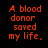 A static image with orange pixelated text on a black background, stating 'A blood donor saved my life. His name is Jesus Christ!' in four lines.