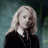 Pixelated image of a person with long blonde hair in a dark outfit against a muted green background, with text overlays reading "Harry Potter's" and "Luna Lovegood Iz Da Best".