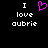 Black background with white pixelated text 'I love aubrie' and a pink heart symbol in the center.