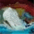 Animated icon shows a white, rounded object floating on blue water with red and yellow background elements. Text labels appear above the object in different frames.
