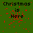 Green background with red pixelated dots scattered across, displaying 'Christmas is Here' text in black pixelated font across multiple repeated sections.