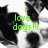 Pixelated black-and-white dog face with green text reading 'i love dogs!!!' overlaid on the center.