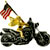 Static pixelated icon of a yellow stick figure riding a black motorcycle with an American flag attached to the front, set against a white background.