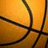 A static image with a blue background, featuring a partial basketball on the left and yellow pixelated text on the right.