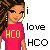 Pixelated image of a person in red shirt with 'HCO' text, next to black text reading 'i love HCO' on white background.