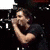 A 50x50 pixel animated contact sheet showing three sequential frames of a person singing into a microphone with visible motion blur and pixelation in the background.
