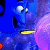 Animated blue cartoon character with wide eyes and yellow mouth, holding pink object against blue background; text changes across frames.