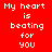 Four pixelated display "My heart is beating for you" text in red, pink, purple, and bright pink backgrounds with white lettering