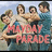 Four pixelated figures in a group pose with pink text overlay reading "FRANKS PARADE" against a light blue background.