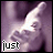 nine shows a hand holding a phone with text changing , displaying phrases like 'just your touch is enough' and 'enough' with pixelated text