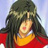 Pixelated image of a person with long dark hair wearing a red and yellow top against a light blue background.