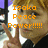Pixelated image of a person with light brown hair making a peace sign, with orange text reading 'Isako Peace Power!!!!!' on the left side.