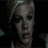 A pixelated image of a person with light-colored hair in three distinct poses showing subtle facial expression changes.