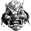 Static grayscale pixel art icon depicting a stylized skull with sharp angular features and abstracted facial elements, rendered in high-contrast black-and-white tones on a transparent background.