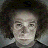 A 48x48 pixel buddy icon divided into a 2x2 contact sheet with four distinct sections: top-left shows a person's face, top-right displays dripping white text "MCR", bottom-left contains the word "Ray" in white, and bottom-right is empty gray space.