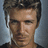A pixelated portrait of a man with styled hair, showing subtle facial expression changes across four views.