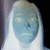 Pixelated blue-toned face with white hair, neutral expression, and closed mouth against dark background with light vertical elements.