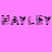 A 4-frame contact sheet of a pixelated text animation showing the name 'HAYLEY' in different colors across four quadrants: pink, blue, green, and gray backgrounds with black lettering.