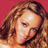 Static 48x48 pixel icon showing a close-up of a person's face with long wavy hair against a solid red background, rendered in low-resolution pixel art style.