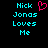 Pixelated cyan text 'Nick Jonas Loves Me' on black background with a pink heart symbol replacing the letter O in 'Loves'.