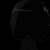 Dark pixelated figure with indistinct features against black background, no visible text or distinct objects.
