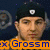 Two pixelated faces side-by-side with orange and red text overlays, one wearing a dark cap with white emblem.