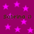 A static image with a magenta background filled by scattered pink stars and repeated dark green text reading "Sabrina :)" in four instances.