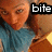 A pixelated image of a person in a blue top with text overlays changing across frames.