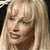 Static 50x50 pixel icon showing a close-up of a person with long blonde hair and light skin tone, rendered in low-resolution pixel art style with visible dithering and color blending.