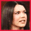 Three distinct facial expressions of a person with long dark hair displayed in a , each within red-bordered frames