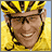 Pixelated image of a person wearing yellow cycling gear and helmet, smiling with visible teeth against a light blue background.