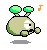 Pixelated green alien-like character with two antennae, white eye, mustache, and small hands in various poses including closed eyes, open mouth, and raised hand.