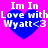 Four identical pixelated blue hearts on a bright pink background, each containing white text reading "Im In Love with Wyatt<3".