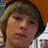 Pixelated image of a person with light brown hair and bangs, red text reading STAY above and REPING DA below on black background.