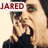 A pixelated image of a person with dark hair and green eyes, wearing black clothing, in three sequential poses showing mouth opening from closed to wide.