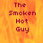 Pixelated text 'The Smoken Hot Guy' in maroon on a fiery orange-yellow background with visible pixelation and partial gray area.