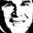 A black-and-white pixelated image of a smiling person's face overlaid with red text elements including 'BET', 'PUNK VOTER', and partial words like 'VETO' in various positions.