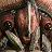 A 48x48 pixel buddy icon split into two sections: a mechanical robot head on the left and green text reading "Original Icons .com" on a dark green background on the right.