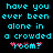 Pixelated cyan text on black background reads 'have you ever been alone in a crowded room?' with pink heart symbols replacing the 'o' and 'm' in 'room'.