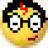 Pixelated yellow face with large white eyes, black pupils, and a small brown mouth, topped with dark hair and a red hair accessory.