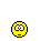 Yellow circular pixel art character with white eyes and black limbs in various poses against gray background.